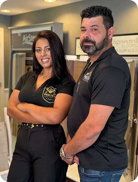 Vanessa and Jacson, owners of Paulista General Contractors, in front of their showroom in Milford MA"