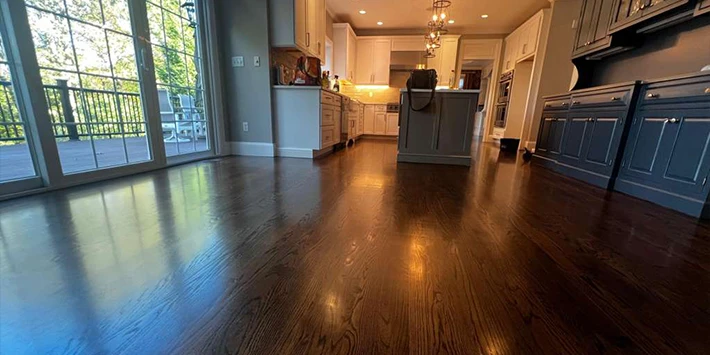 Hardwood floors refinished Paulista General Contractors, in front of their showroom in Milford MA